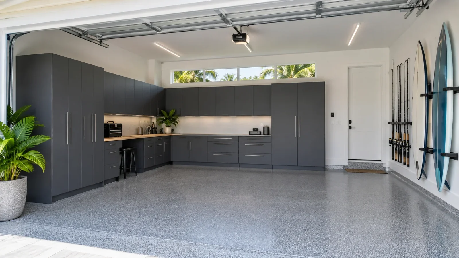 Finished garage combining a flake floor, cabinets, gear storage and work area